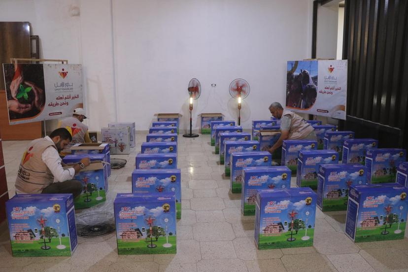 Distribution of fans to some needy people in northern Syria, which coincided with the intense heat wave
